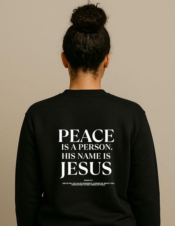 PEACE IS A PERSON, HIS NAME IS JESUS UNISEX SWEATSHIRT