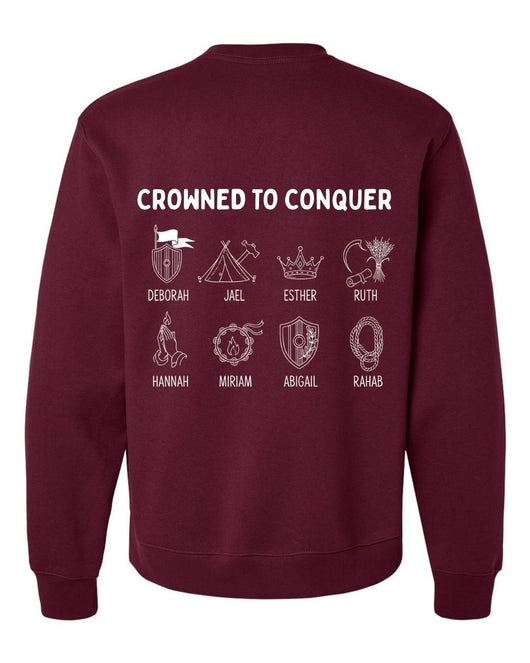 Maroon sweatshirt with 'Crowned to Conquer' text and illustrations on the back
