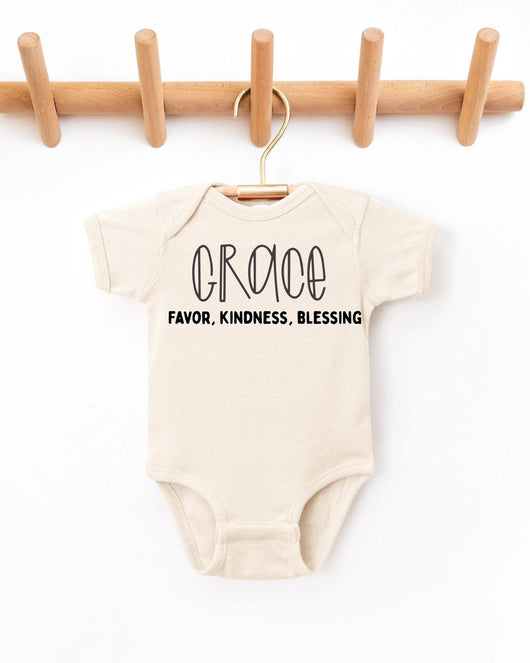 Beige baby onesie with text on a white background