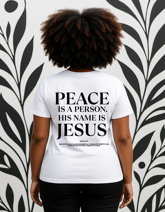 Faith-based women’s t-shirt reading “Peace Is a Person” in script; available in black (Midnight Prayer) and white (Pure Dawn), inspired by Psalm 126.